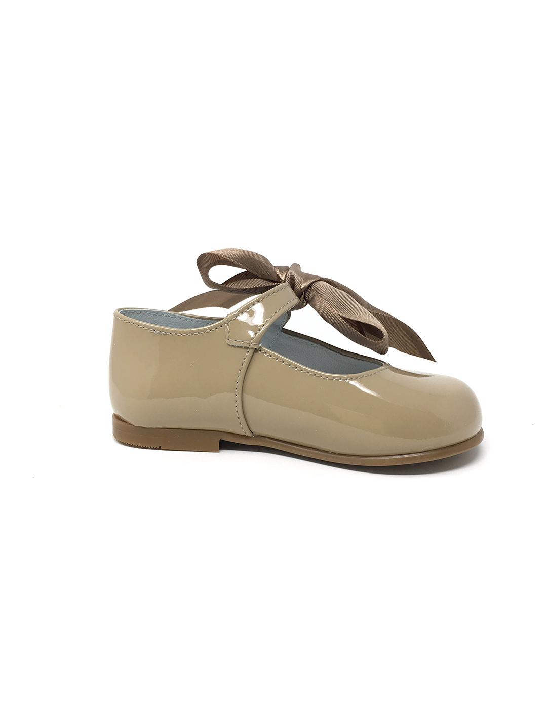 MERCEDITA CHAROL TOSTADO